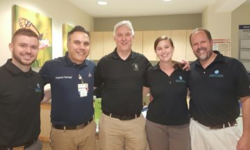 Team of MCOP employees smiling for the camera